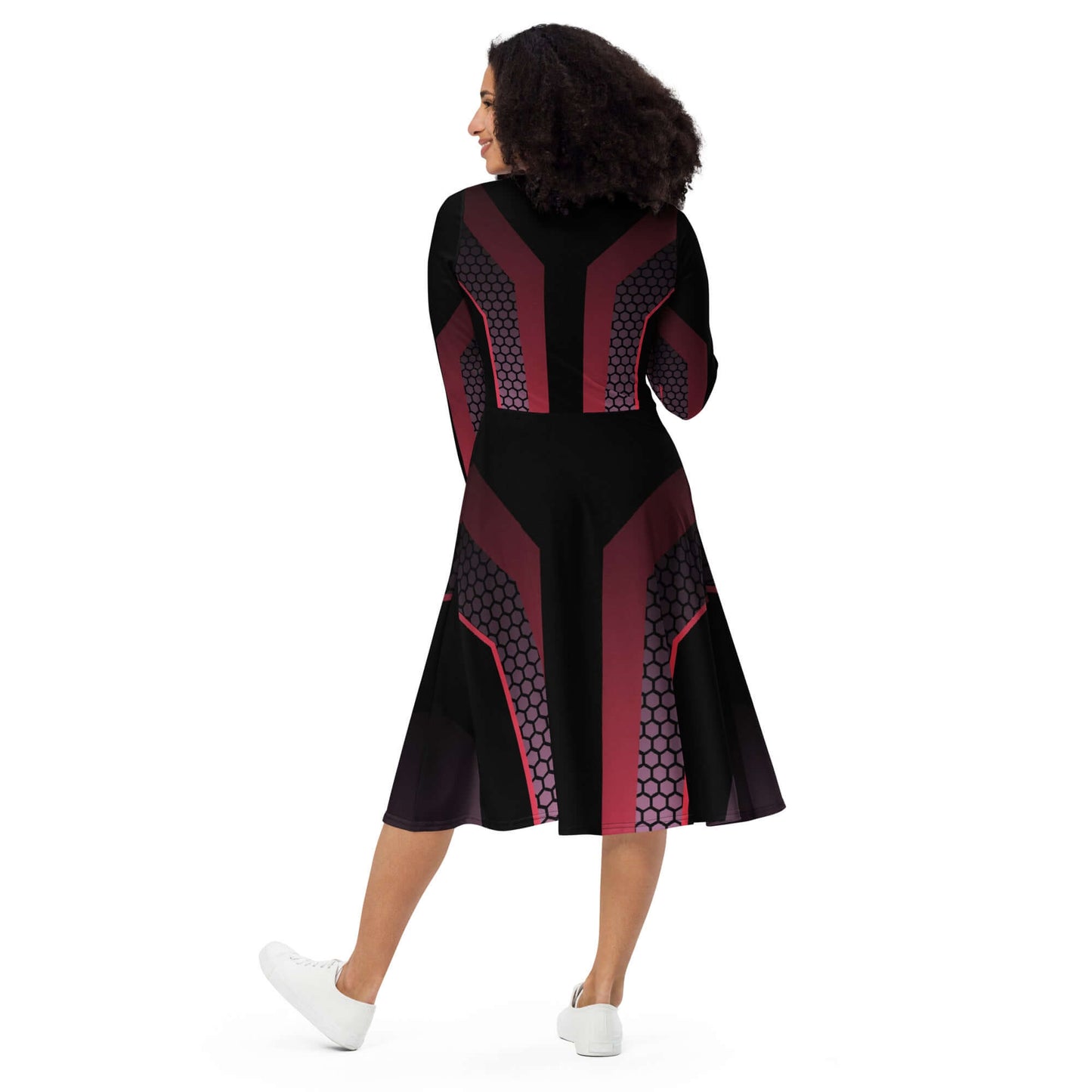 Back view of a woman in a futuristic black and red midi dress with long sleeves, showcasing a stylish urban design.