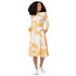 Charming long-sleeve tie-dye midi dress in yellow and white, featuring pockets and a flared hem for a stylish look.