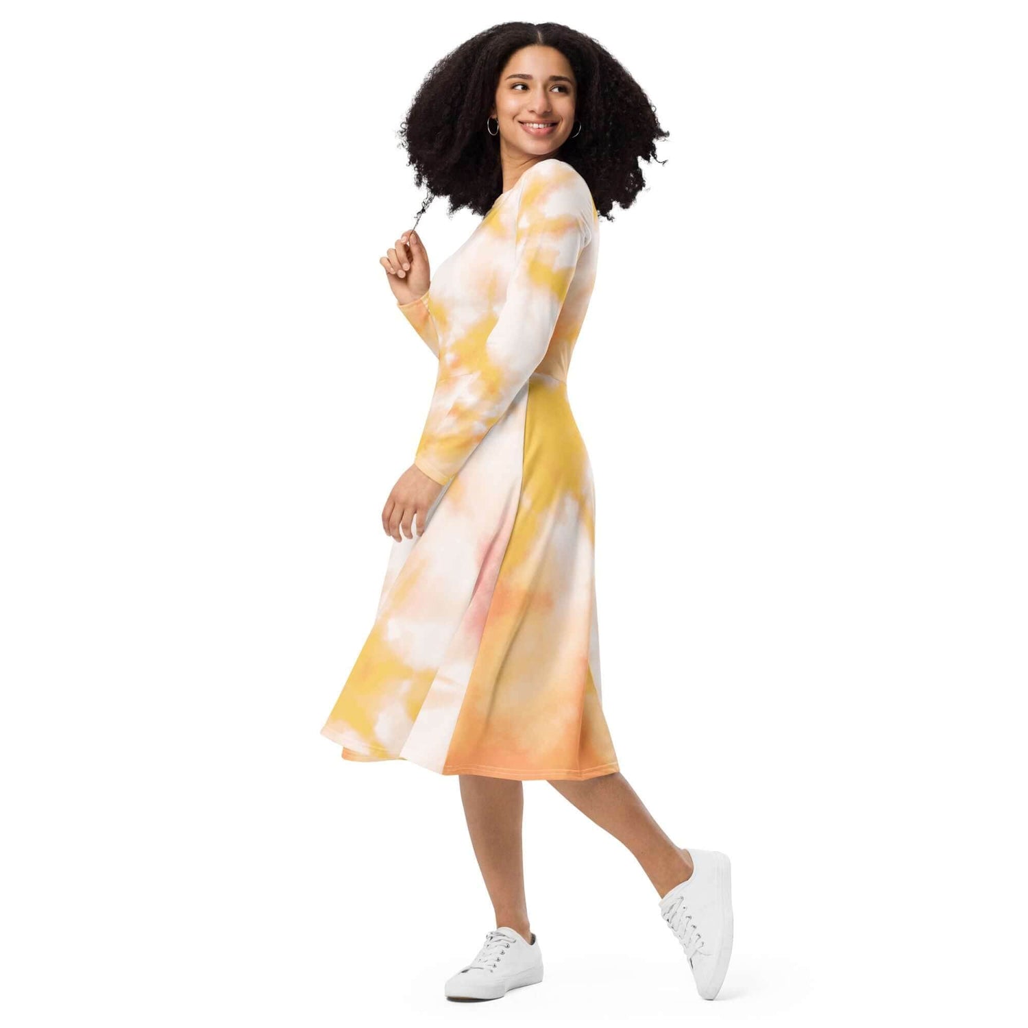 Charming tie-dye midi dress with long sleeves in yellow and white, perfect for a stylish and comfortable look.