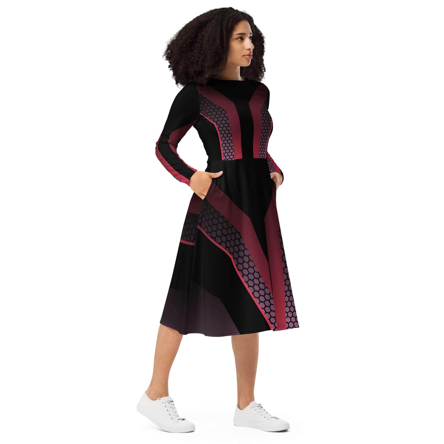 Futuristic midi dress with long sleeves in black and red, featuring a flattering cut and pockets for modern style.